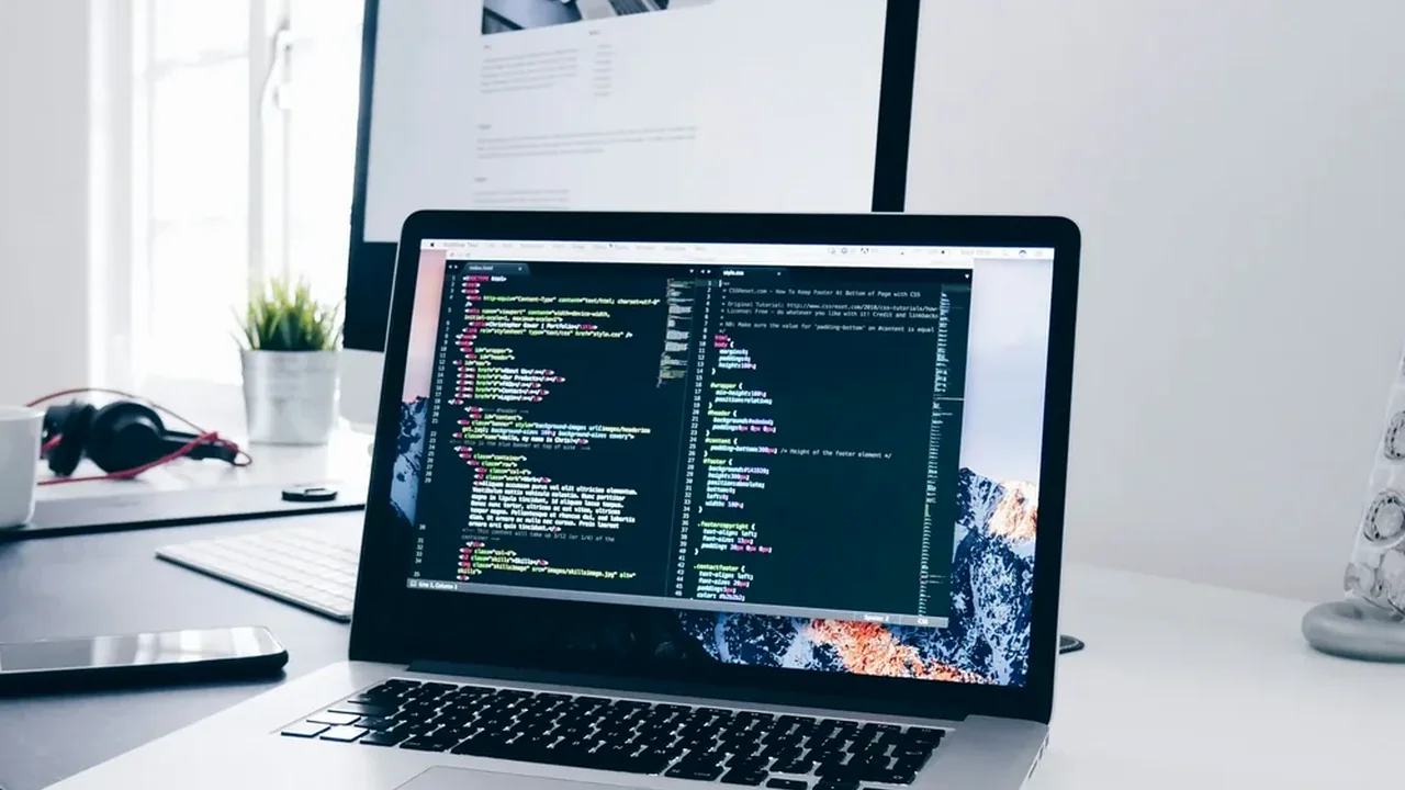 Developer laptop showing application source code