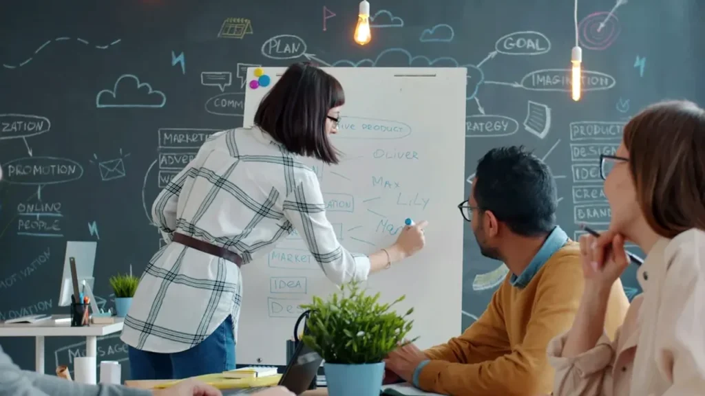 Cloud infrastructure project planning and team at a whiteboard